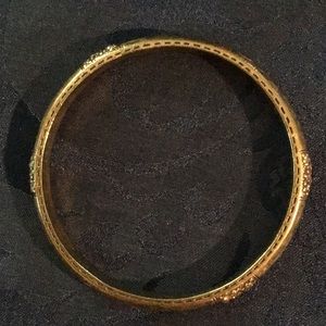 Chico’s Gold Tone Solid Bangle bracelet.
